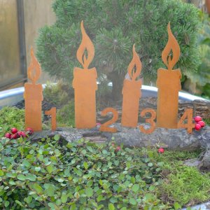 Kerzenflamme mit Adventszahlen 1-4