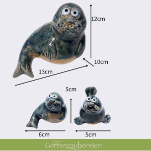 Seehund gebogen mit 2 Kindern und Dekosteinen